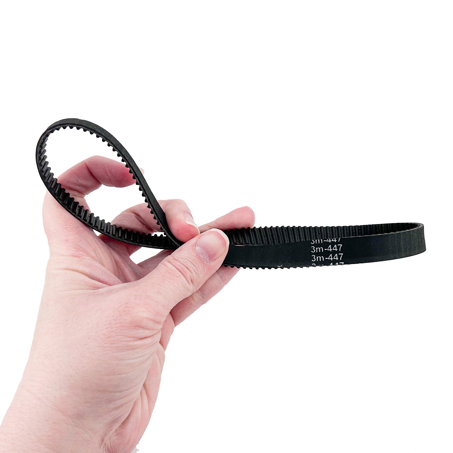 Hand holding the 447-3M/12 Drive Belt for Razor E100 & Bladez Ion 150, showing the black rubber belt's texture and quality.