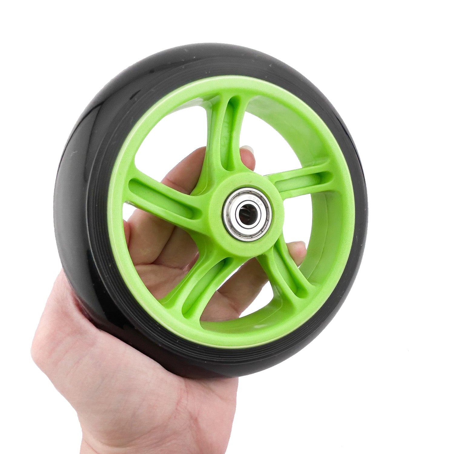 Hand holding a 140 mm diameter front wheel for the Razor Power Core 90 & Power Core E90 electric scooters, featuring pre-installed bearings for easy replacement.