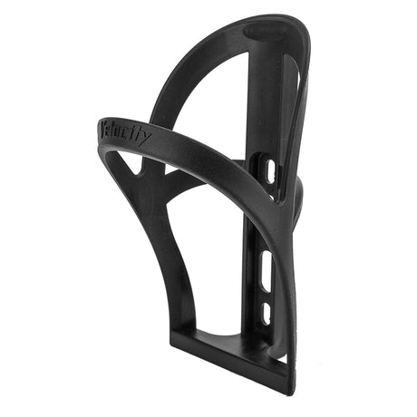 Velocity Polypropylene Bottle Cage, a lightweight and durable black plastic holder designed for water bottles, shown in a sleek, minimalist design, perfect for economical and functional use on bikes.