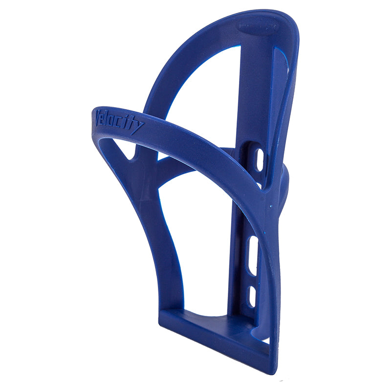 Velocity Polypropylene Bottle Cage shown as a lightweight, blue plastic holder designed for bicycles, emphasizing durability and performance.