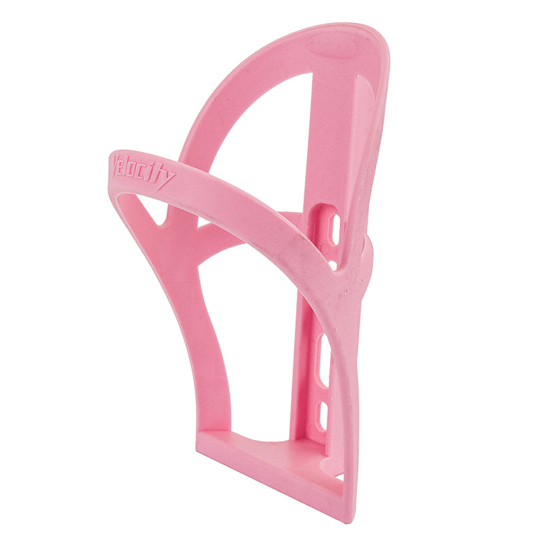 Velocity Polypropylene Bottle Cage, a lightweight and durable pink bottle holder designed for performance and affordability, shown on a plain white background.