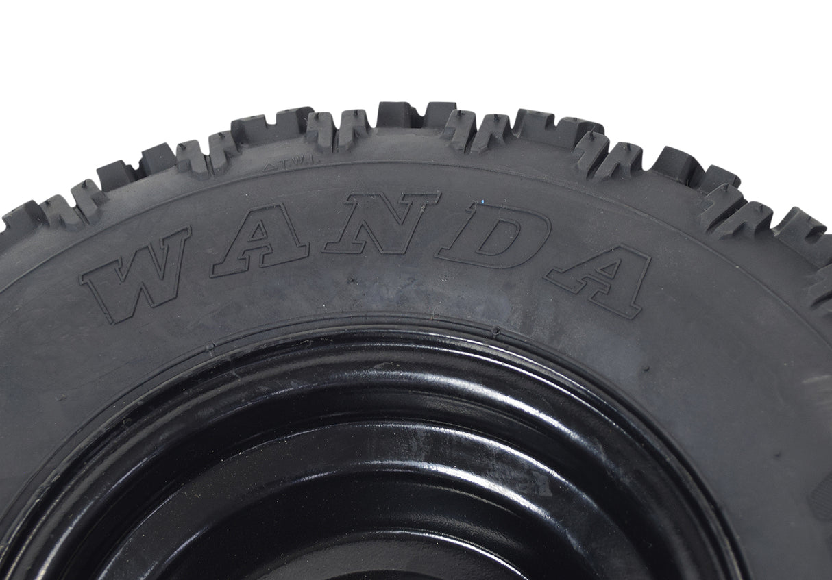 Close-up view of the 13x5.00-6 Front Tire and Rim Wheel Assembly for Coleman CK100 & SK100 Go-Karts, showing detailed tread pattern and mounted on a steel rim.