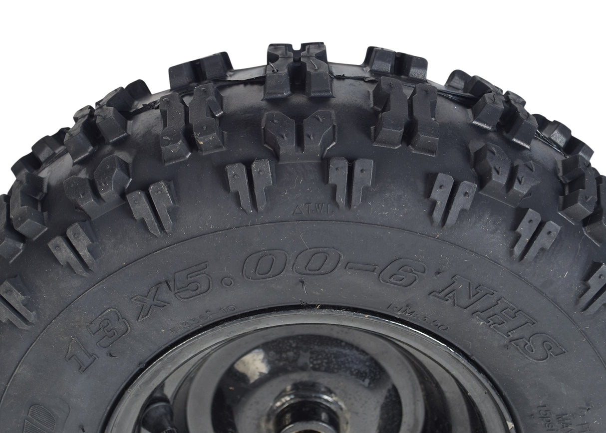 13x5.00-6 Rear Tire and Rim Wheel Assembly for Coleman CK100 & SK100 Go-Karts, featuring a close-up of the black enamel steel rim, knobby tread, and 3/4 axle bore.