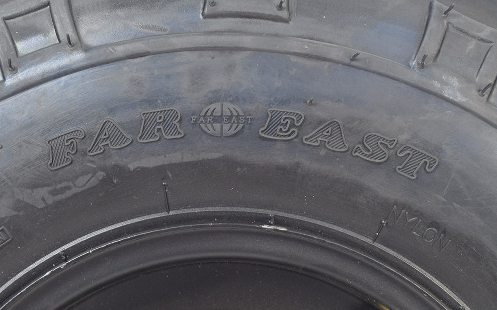 Rear Wheel Assembly for the Monster Moto / Mega Moto Classic 212cc (MM-B212) Mini Bike, featuring a close-up of the tubeless pneumatic tire with a mud-slinging V-tread and visible bearings and spacers.