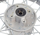 12 (3.00-12) Rear Rim & Tire Wheel Assembly for Dirt Bikes with Disc Brakes (Version 1) (Blemished) close-up shows spoked rim, knobby tread tire, hub, and bearing. Minor hub damage visible.