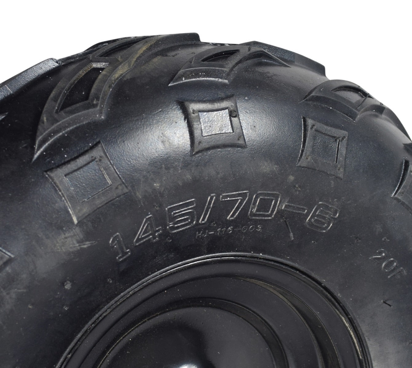 Close-up of the Front Wheel Assembly with Rim & Tire for the Realtree RTK200 Go-Kart, featuring a robust 145/70-6 tubeless pneumatic V-tread tire for enhanced traction.