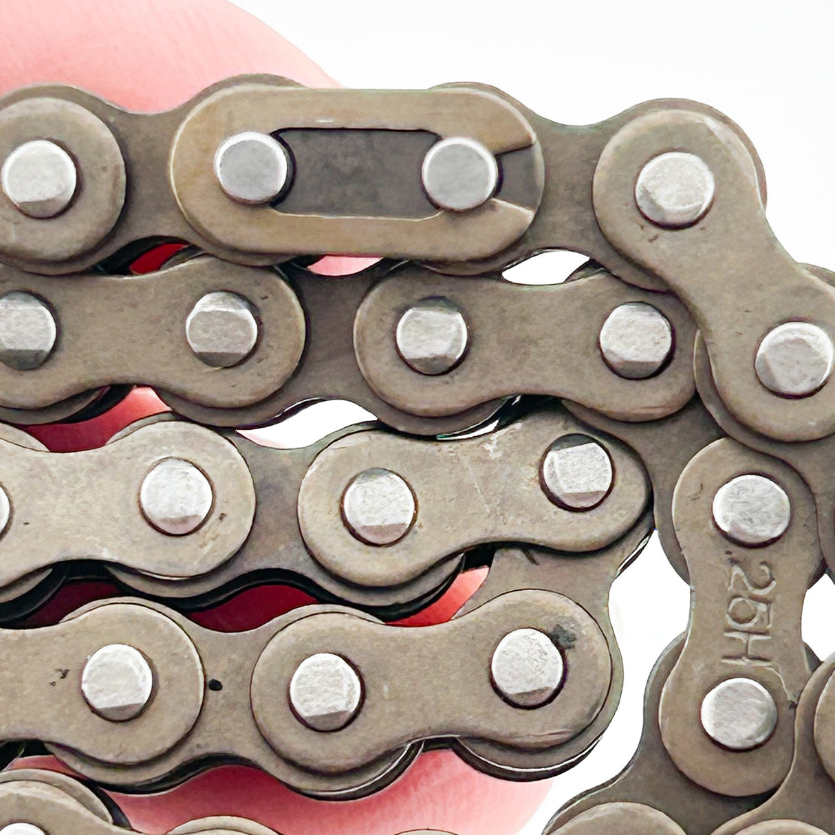 70 Link #25 Chain for Monster Scooter Parts, showcasing multiple round metal links in close-up. Suitable for eZip Nano (EZ2) and Nano Carver (EZ3) electric scooters.