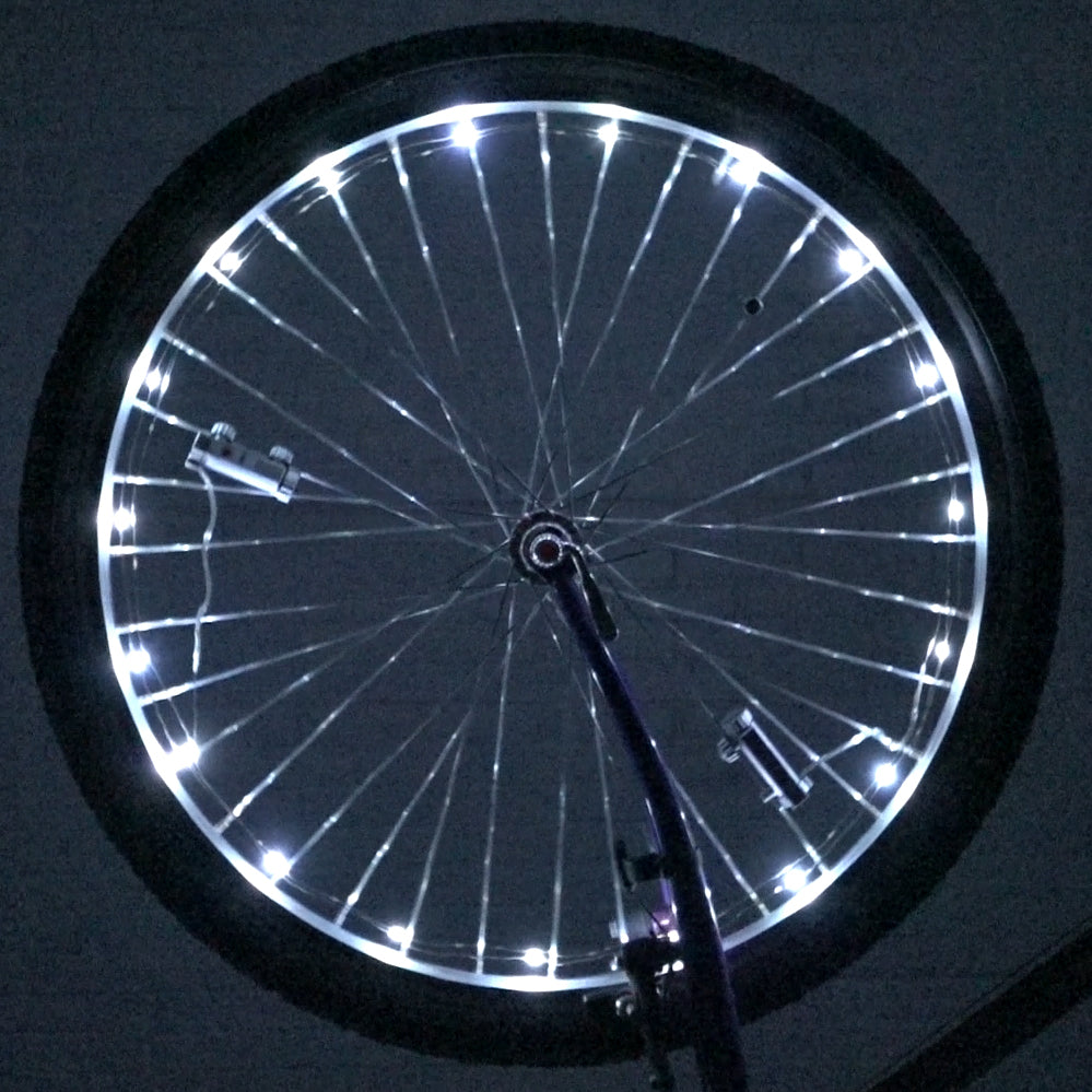 LED Bicycle Rim Spoke String Lights displayed on a bicycle wheel, featuring 20 LED lights on an 86-inch string, enhancing low-light safety with steady and flash modes.