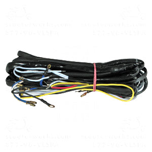 Wiring Harness for 1960s and 1970s Vespas: A bundle of black wires tied together, designed for vintage Vespa scooters, providing regulated power and updated switches for improved functionality.