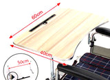 Wood Veneer Tray Table for Wheelchairs with a woodgrain laminate surface, folding steel supports, and mounting clamps. Measurements and a close-up of the handle are visible.