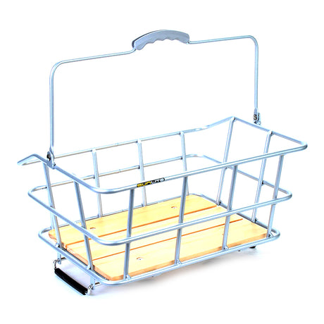 Quick Release Rack Top Woody Basket features a metal construction with a wooden handle, mounted on a bike's rear rack using spring-loaded clamps, ideal for carrying gear or lunch.