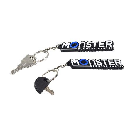 Standard Key for Go-Go and Pride Mobility Scooters, shown with a durable half-circle black plastic head and metal key, attached to a key ring.