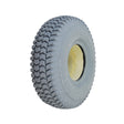 3.00-4 (10x3, 260X85) Foam-Filled Mobility Tire with C248 Powertrax Tread, showcasing a close-up of the knobby tread pattern and solid non-marking gray rubber. Ideal for mobility scooters and power chairs.