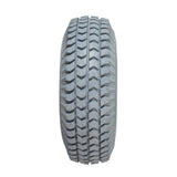 Close-up of a 3.00-4 (10x3, 260X85) Foam-Filled Mobility Tire with C248 Powertrax Tread, showcasing the knobby tread pattern designed for mobility scooters and power chairs.