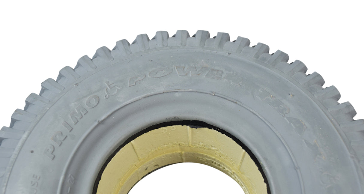 Close-up of the 3.00-4 (10x3, 260X85) Foam-Filled Mobility Tire with C248 Powertrax Tread, showcasing its knobby tread pattern designed for mobility scooters and power chairs.