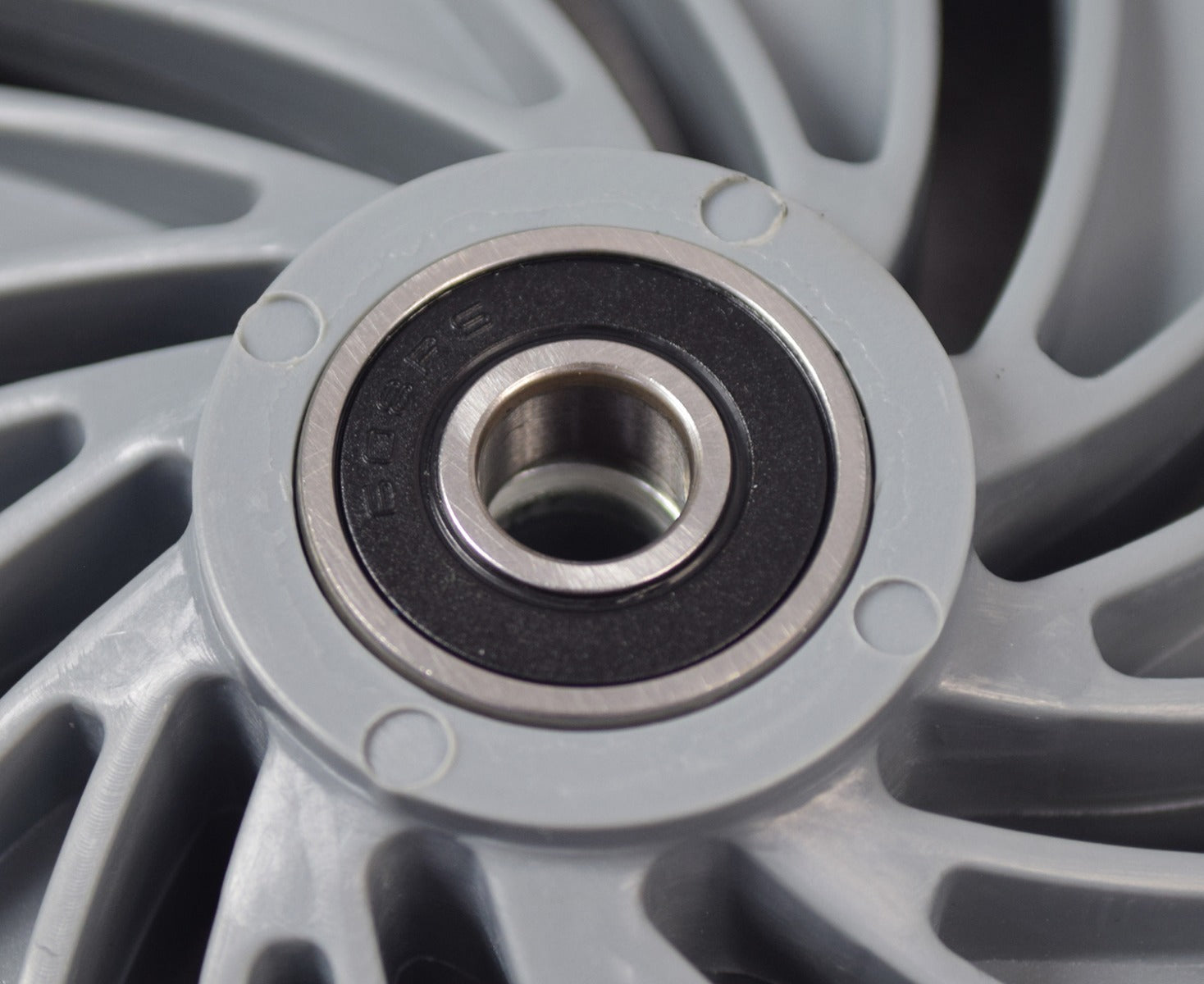 Front Wheel Assembly for the GOTRAX GKS Electric Scooter, featuring a close-up of a 10-spoke rim with a solid 6 flat-free tire and pre-installed 608RS bearings.