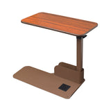 Seat Lift Chair Side Table with a teak-grained laminate finish, height-adjustable surface, and built-in magazine rack. The table base fits under chairs for stability, making it ideal for multiple uses.