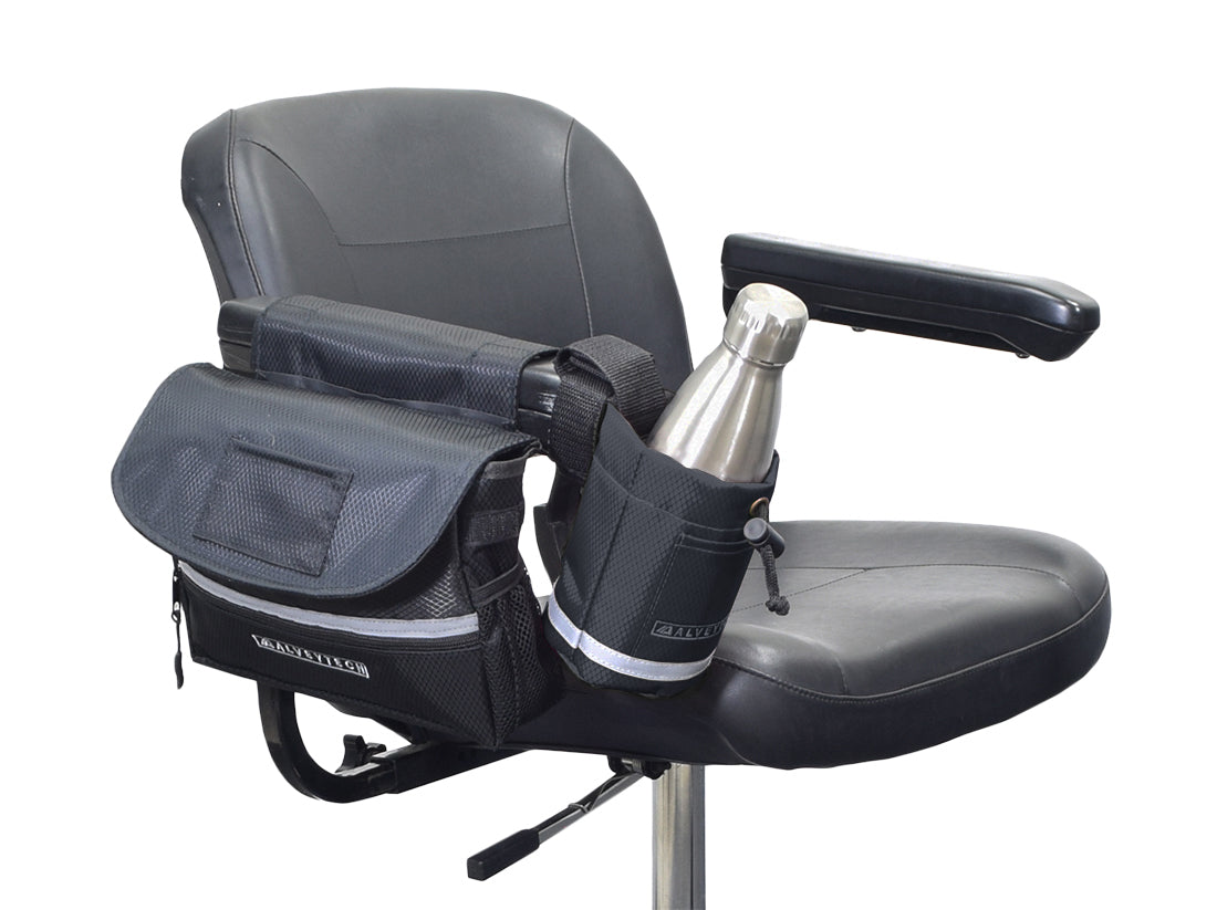 Saddle Bag, Cup Holder, & Grips Combination Set for Mobility Scooters, Power Chairs, & Wheelchairs displayed on a black chair with a metal bottle in the cup holder.