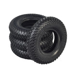 200x50 (8x2) Tires for the Razor Dune Buggy (Set of Four), featuring distinct treads for paved and dirt surfaces, shown in a neat stack highlighting tread patterns and durable construction.