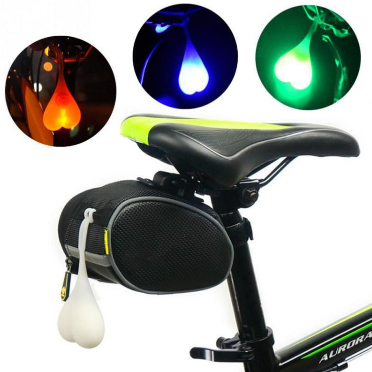 Inverted Heart Tail Light for Bikes and Scooters, featuring a dangling heart-shaped light with three lighting modes for enhanced safety and visibility during night or inclement weather rides.