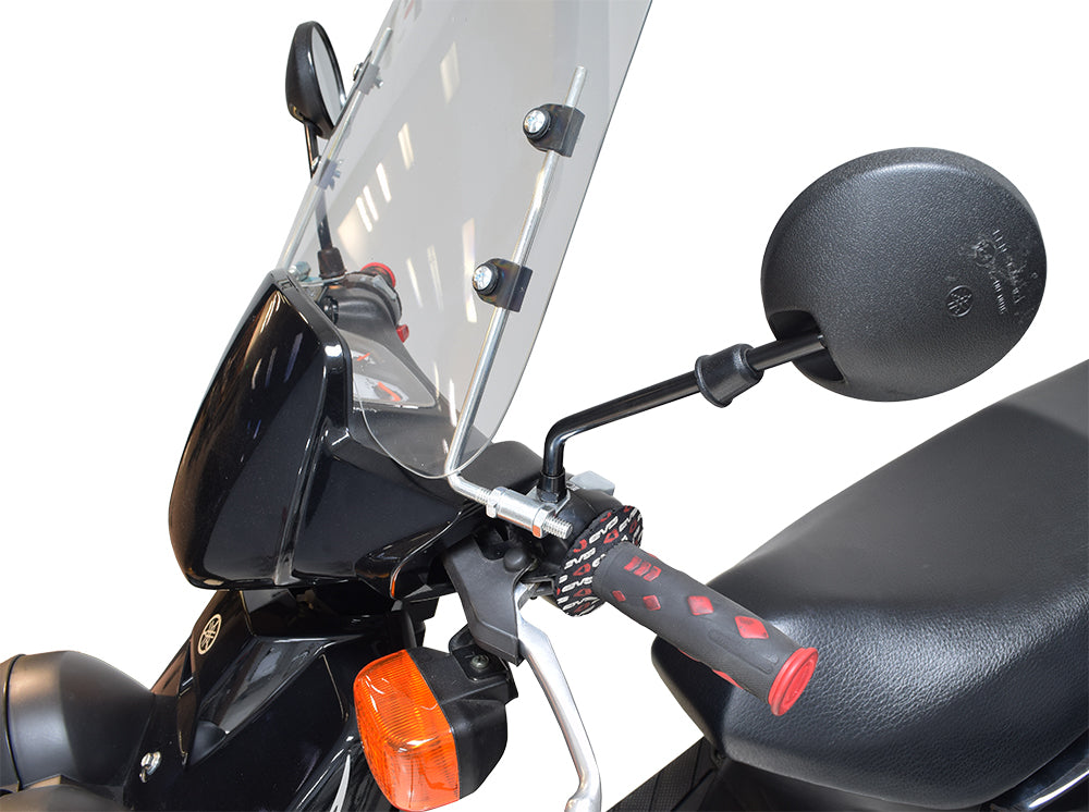 Close-up of the Universal Scooter Windshield mounted on a motorcycle handlebar, showcasing its clear, protective surface and sturdy hardware, designed to enhance rider comfort and safety against debris.