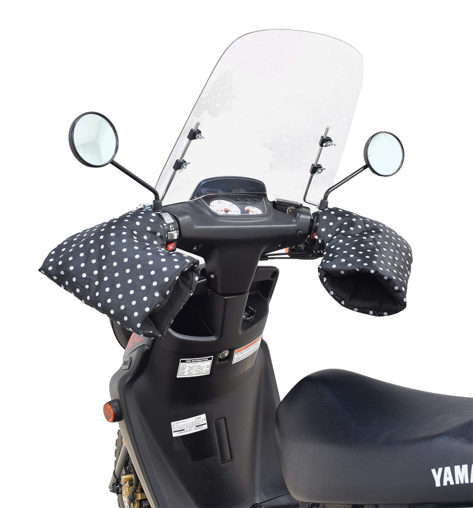 Waterproof Hand Mitts for Scooters, ATVs, & Bikes featuring a black and white polka dot design, attached to handlebars, ensuring warmth and protection from cold weather during rides.