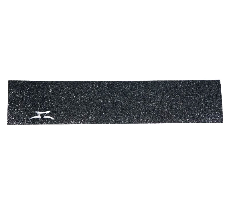 AO Graffiti DyeCut Grip Tape featuring a black rectangular surface with a white die-cut logo, revealing the scooter deck color beneath. Provides superior grip for enhanced kick scooter control.