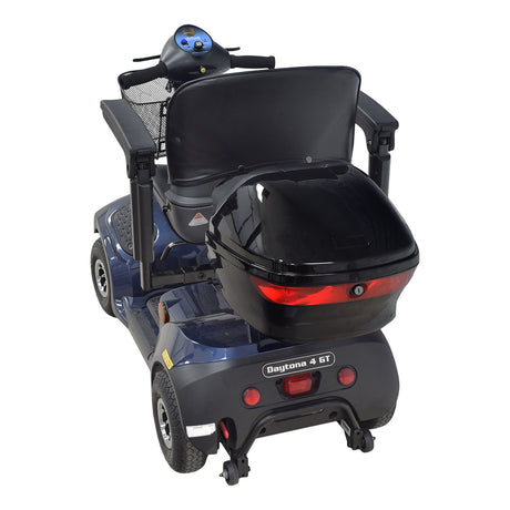 Universal Mobility Scooter Rear Trunk & Bracket Assembly shown attached to a blue scooter, featuring a black seat and rear storage case with a red light. Trunk provides spacious storage and includes three quick-release pins.