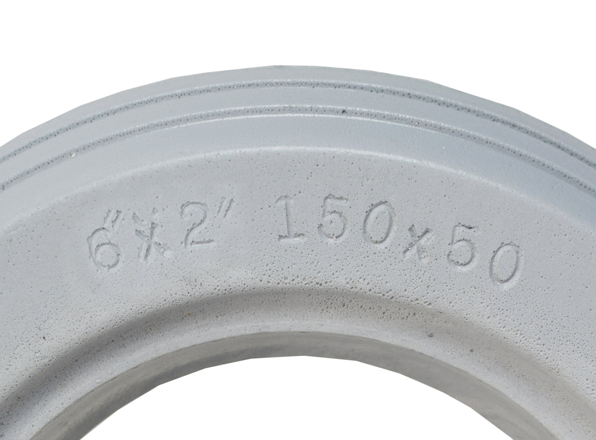 Close-up of the 6x2 (150x50) AeroFlex Solid Urethane Mobility Tire with 4-Rib Tread, highlighting the durable, flat-free design and detailed ribbed surface for enhanced traction.