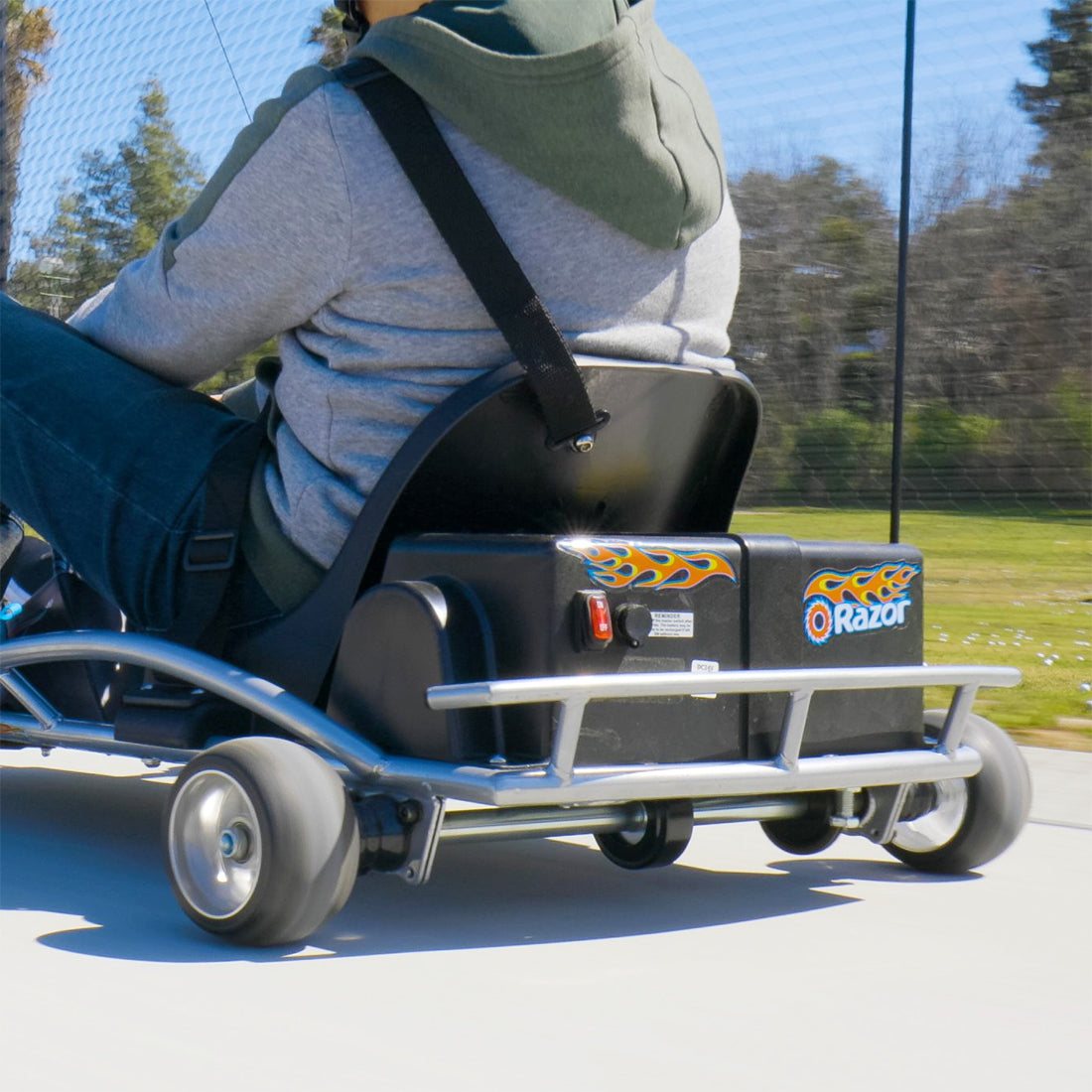 24 Volt Battery Pack for the Razor Ground Force Go-Kart, featuring two 12V 7Ah batteries with wiring harness, shown installed in a go-kart with visible wheels and seatbelt.