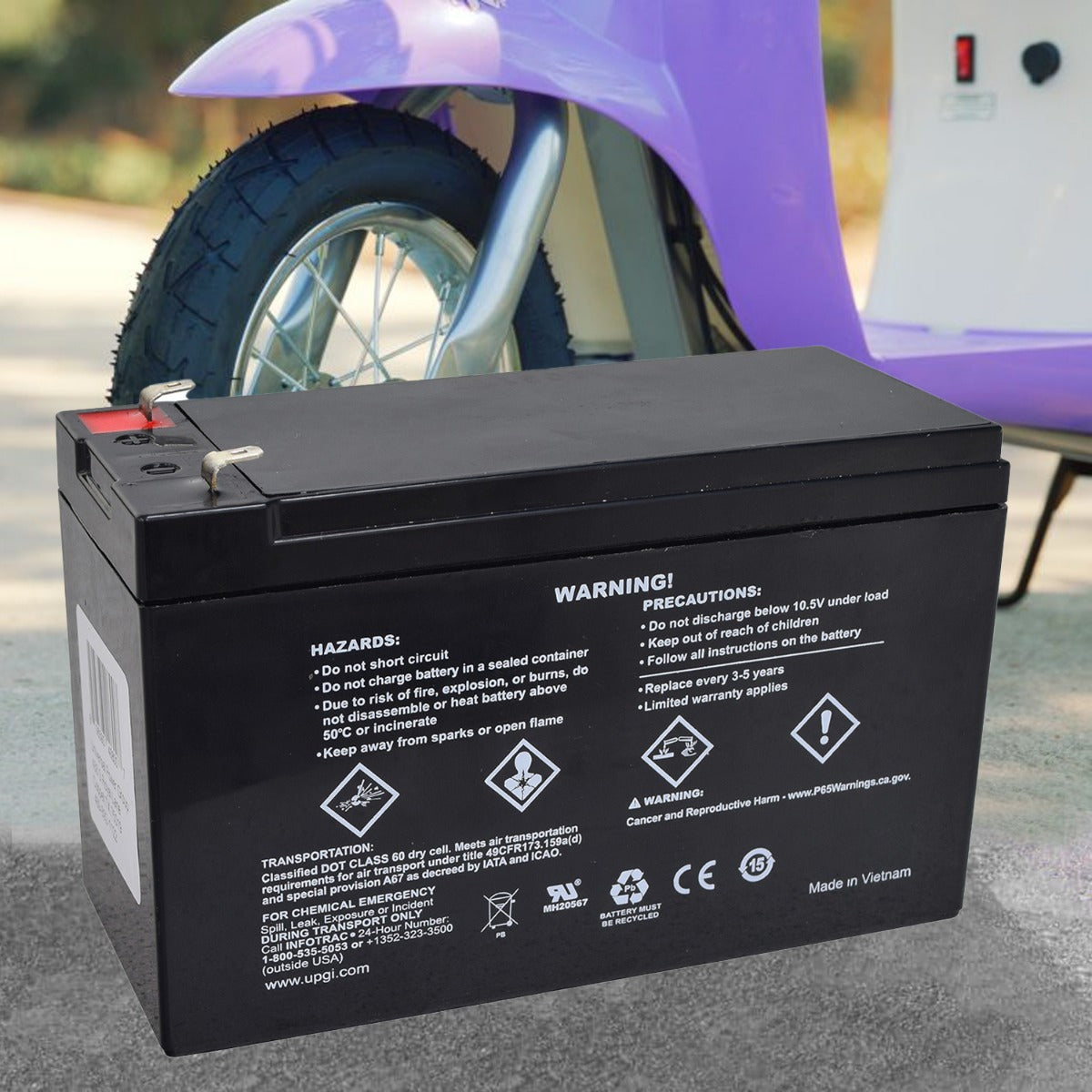 24 Volt Battery Pack for the Razor Pocket Mod, featuring a black rectangular battery with white text and red buttons, situated next to a purple scooter.