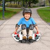 Child wearing helmet and knee pads sitting on a skateboard, representing the 12 Volt Battery for the Rollplay Nighthawk, designed for high performance in ride-on toys.