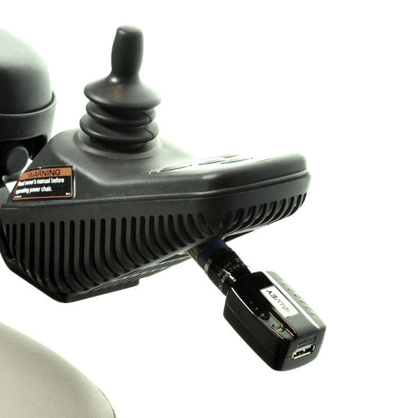 USB Charging Adapter for Scooters and Power Chairs, featuring a compact black device with an XLR to USB port, designed for charging electronic devices directly from a scooter or power chair's charging port.